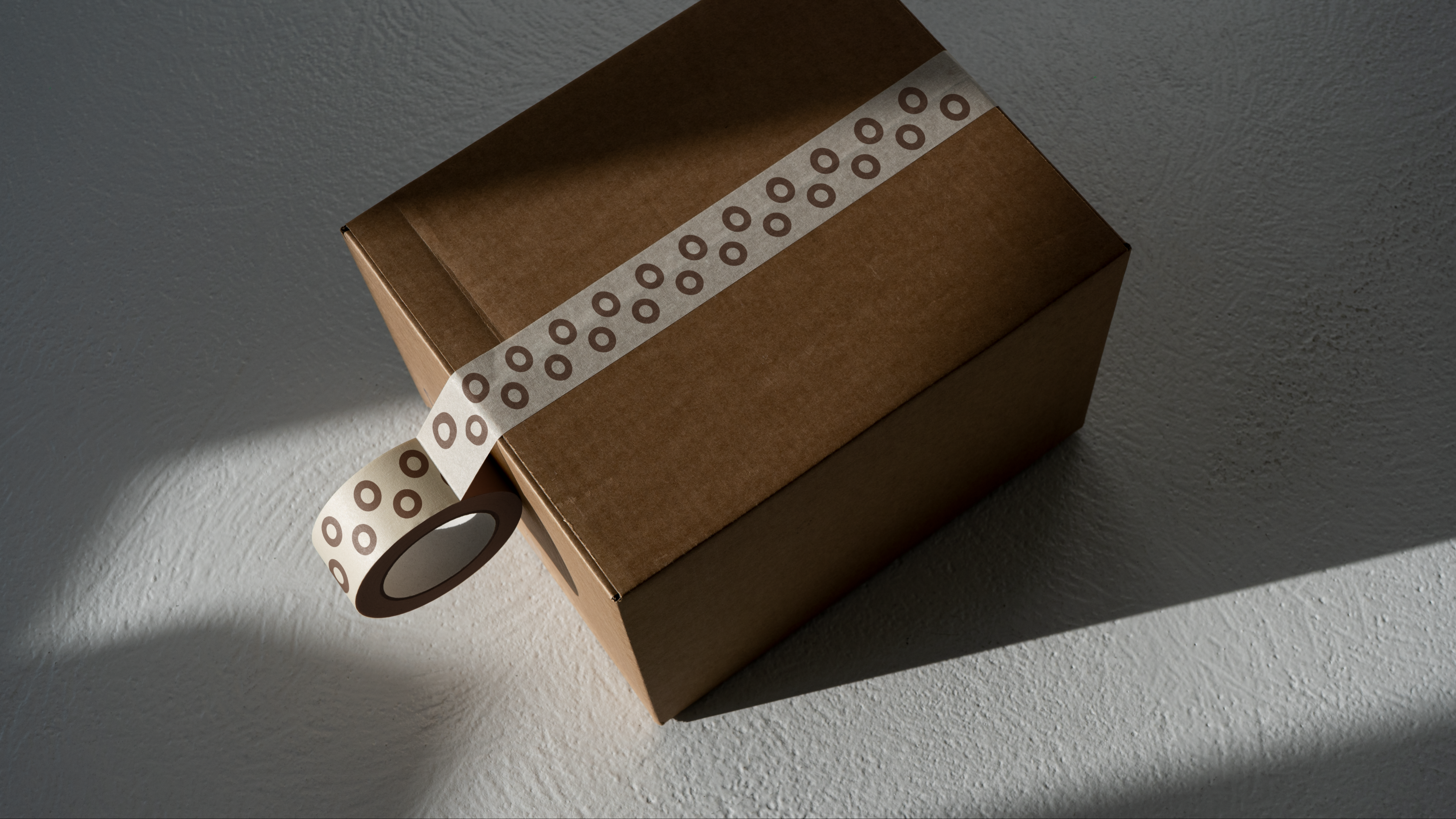 Forma packaging tape on box